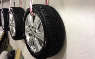 Стойка для хранения колес в гараже: полка для автомобильных шин на стену
